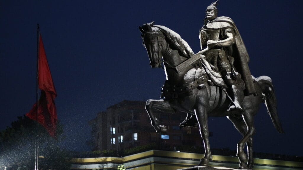 Skanderbeg statue in Tirana in the winter covered in snow.